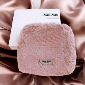 Miu Miu Blush Fur Clutch/makeup bag with box.